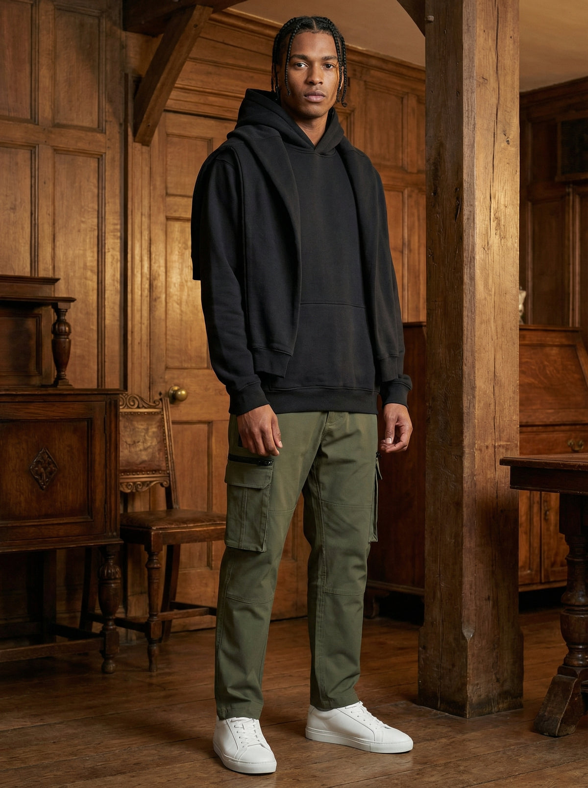 Man wearing the black CloudSoft cotton fleece pullover hoodie