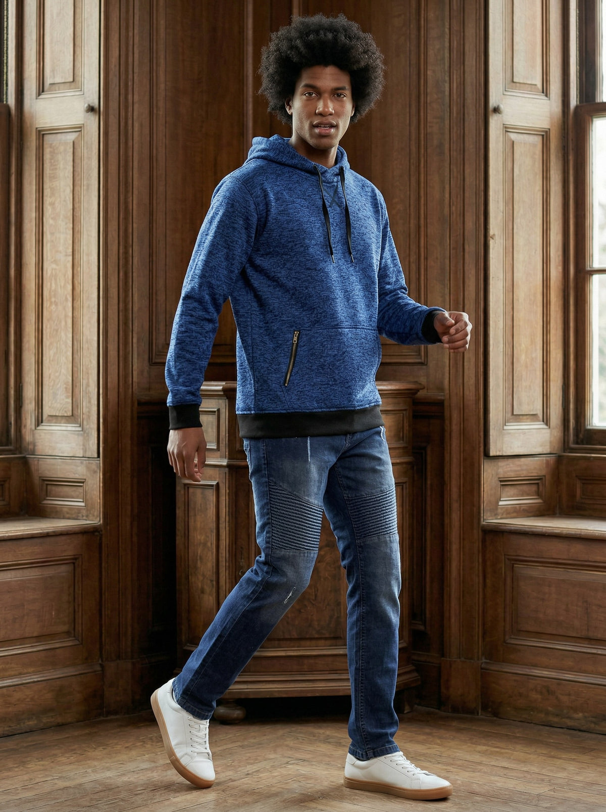 Man wearing the cationic royal blue fleece pullover hoodie