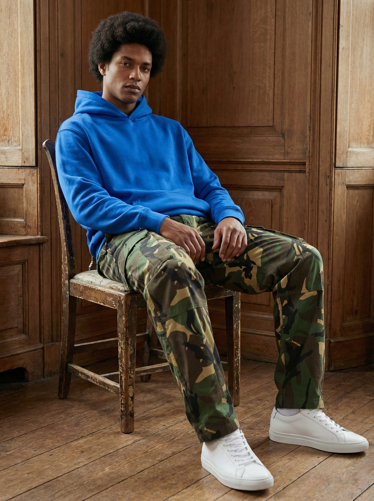 Man wearing the royal blue CloudSoft cotton fleece pullover hoodie